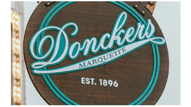 Donckers in Marquette street sign logo. Established in 1896!